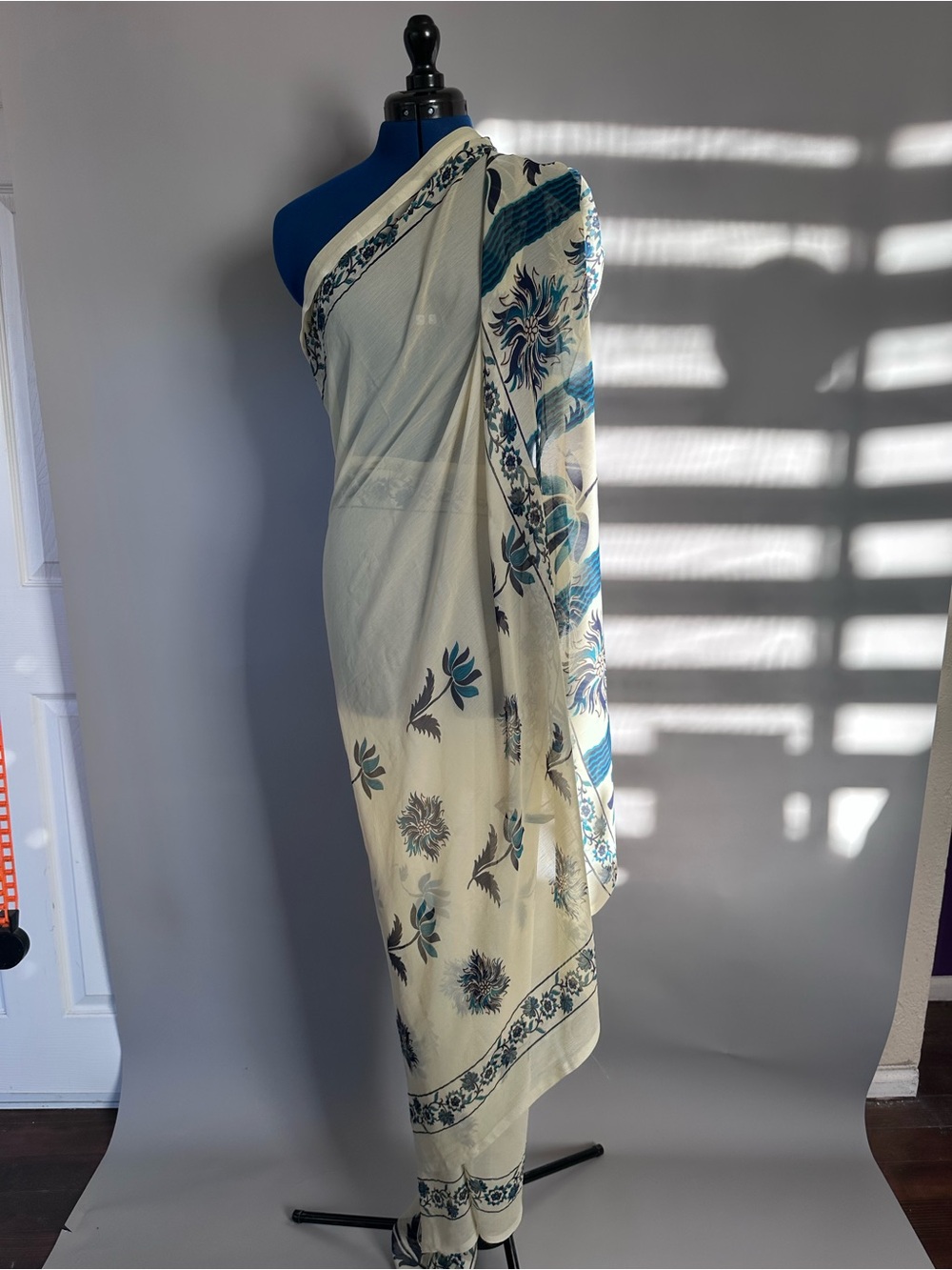 Women's Silk Cream and Teal Floral Hand Screen Printed Draped Saree